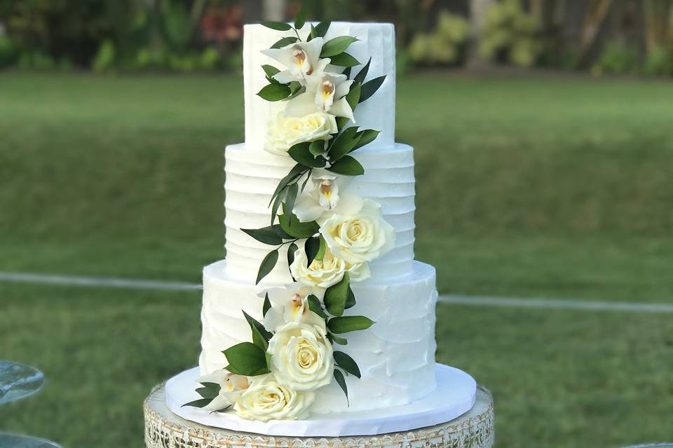 White wedding cake with flowers