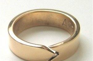 In sterling and 14k goldPersonalized with hand engraving.