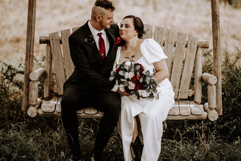 Bride and groom on swing