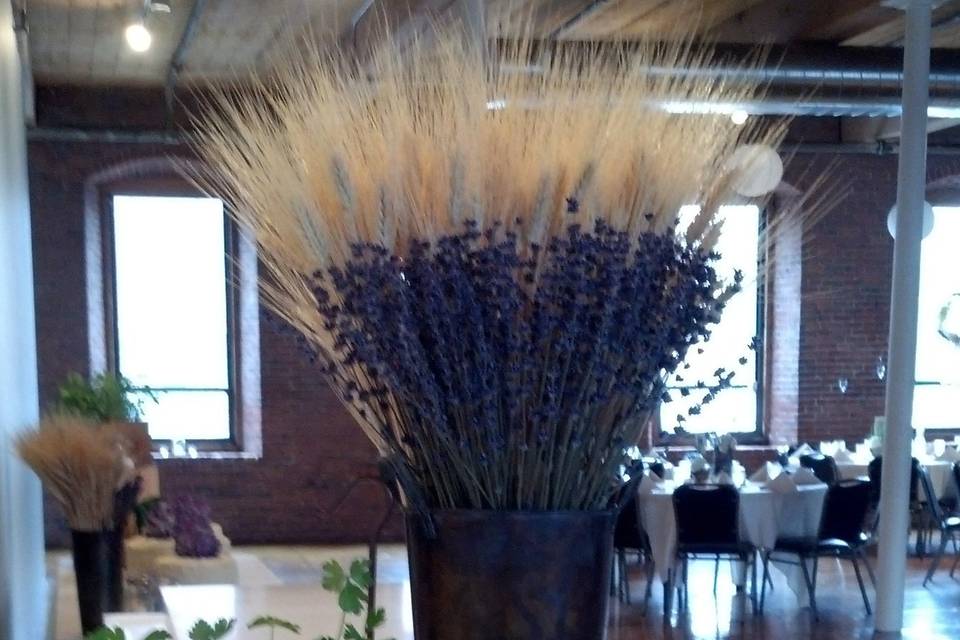 Beautiful bar arrangement with frsh herbs, lavender and wheat.