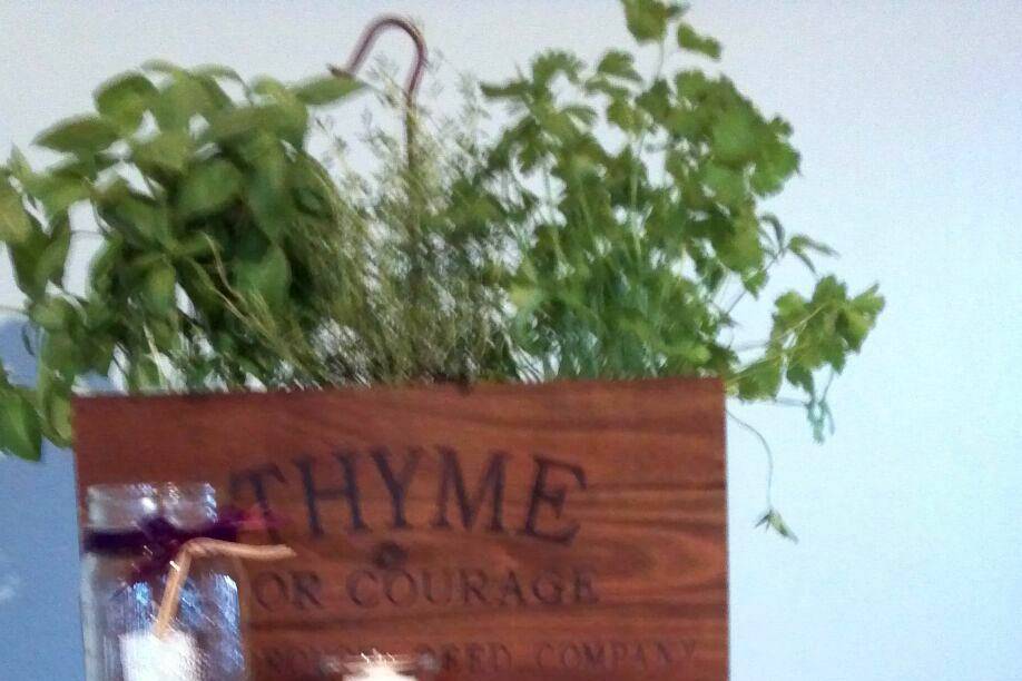 Moss letters and fresh herb box on cake table. Custom design by Lady  Slipper Affairs & Events.
