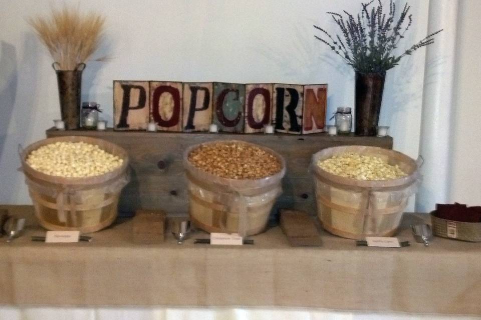 Cocktail area popcorn table. Design Lady Slipper Affairs & Events.