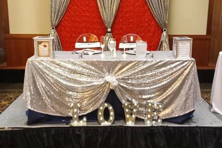 Sweetheart table with backdrop