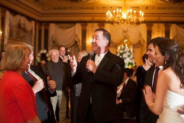 MC/DJ entertaining the guests