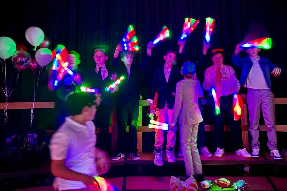 Kids dance with glowsticks