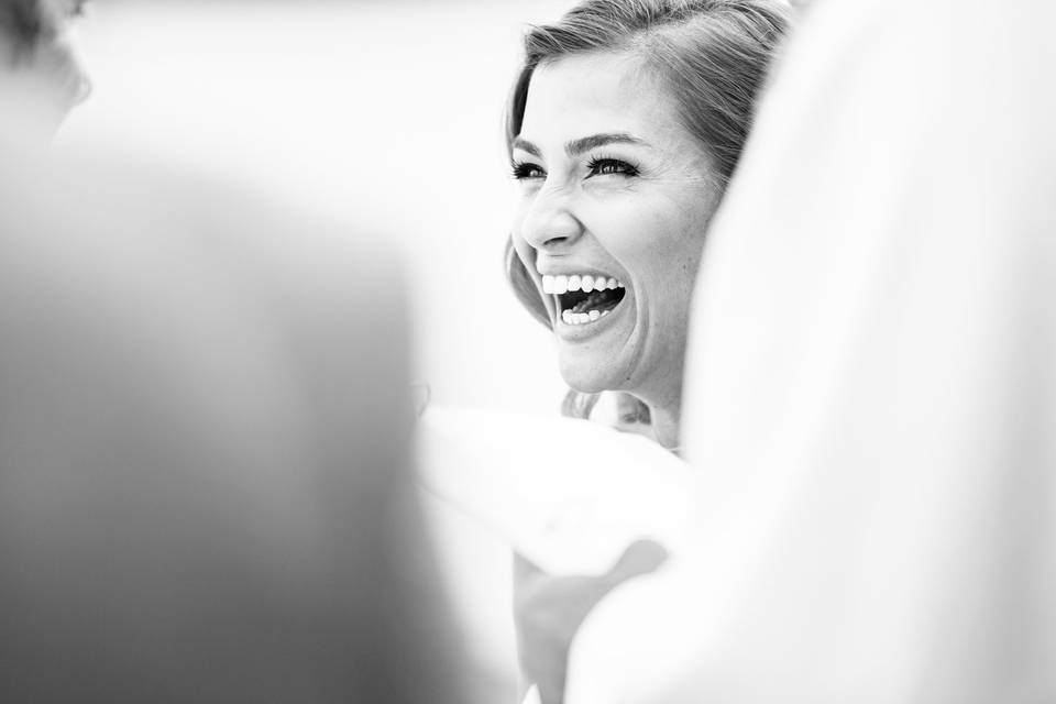Bride smiles on the altar