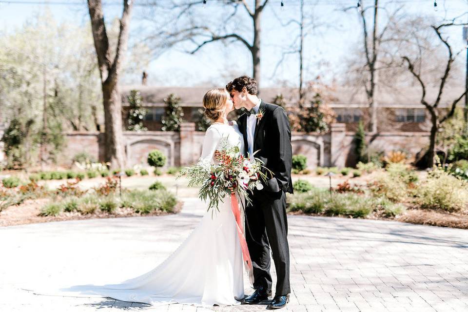 Newlyweds kissing