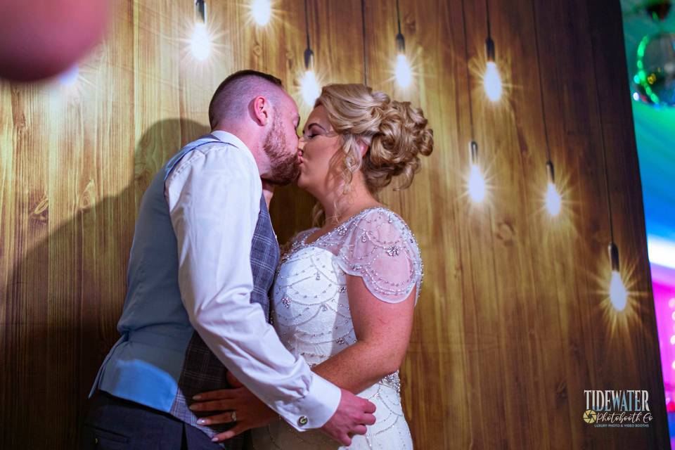 Bride & Groom share a kiss