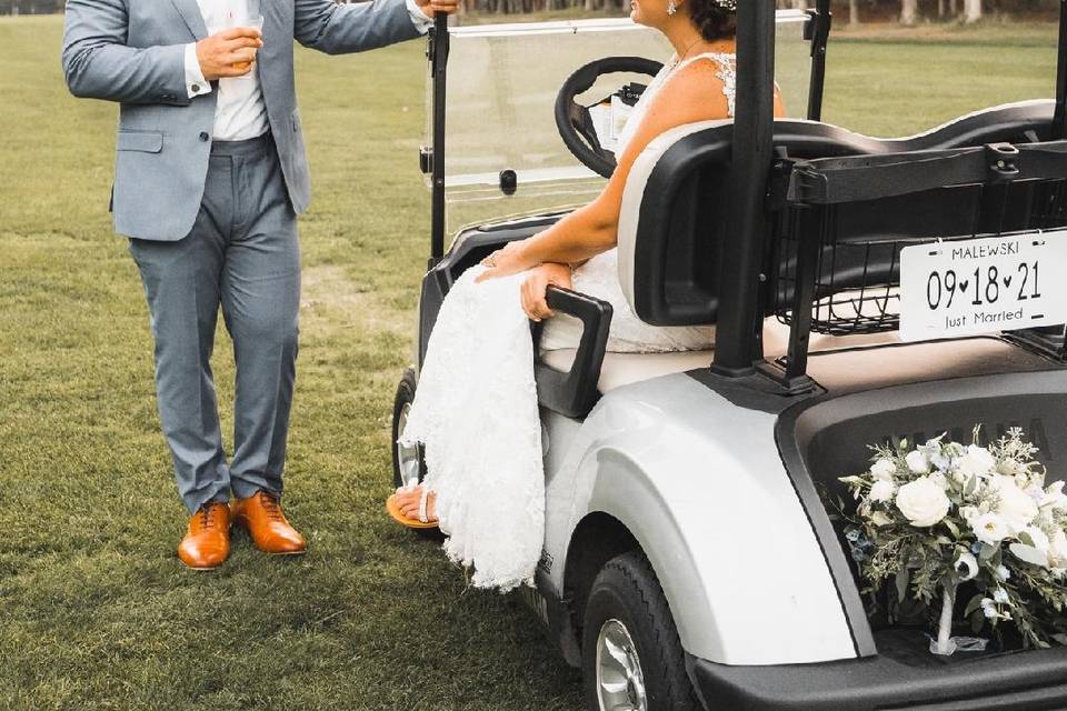 Bride and groom with cart