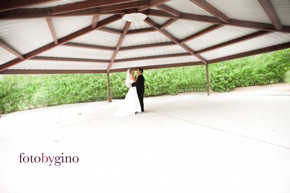 Couple dancing in the wide ballroom