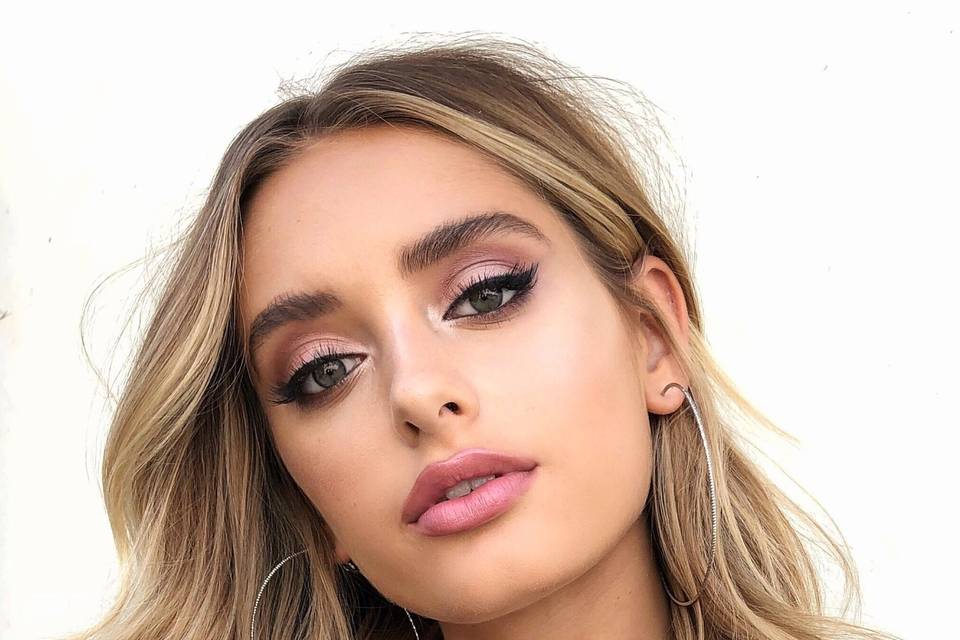 Nude lip and winged liner