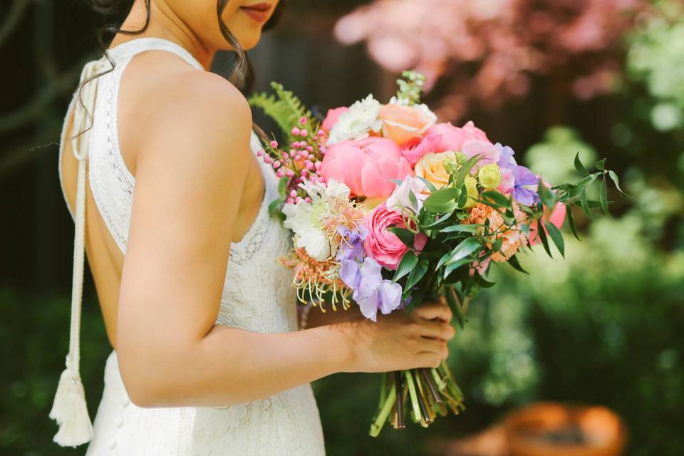 Close-up of bride and bouquet