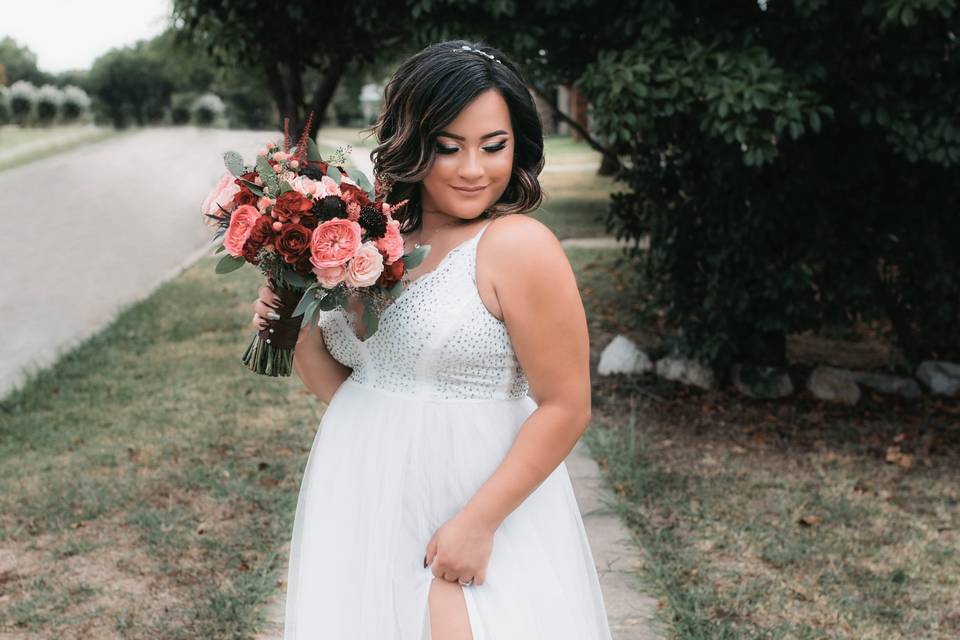 Bride with dress and bouquet