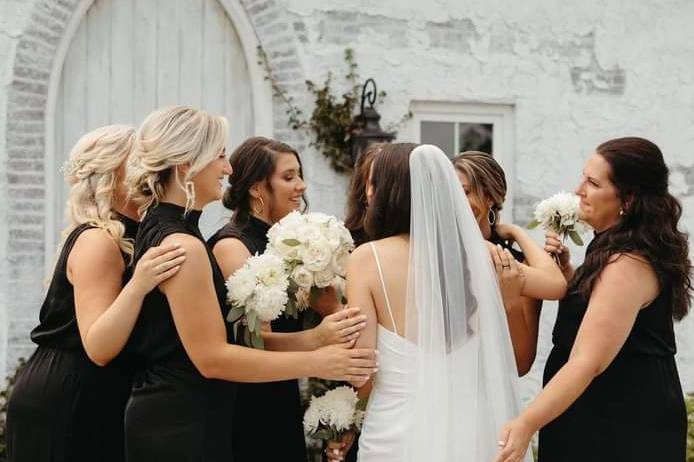 Bride Huddles with the Girls