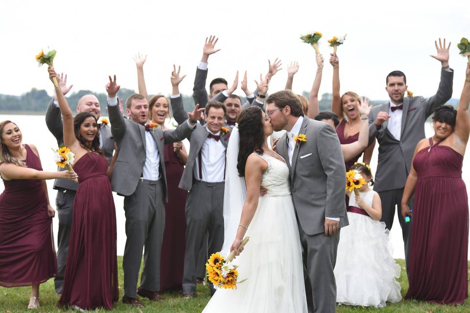 A cheering wedding party