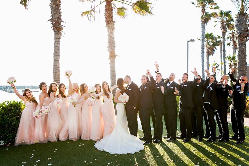 The couple with the bridesmaids and groomsmen