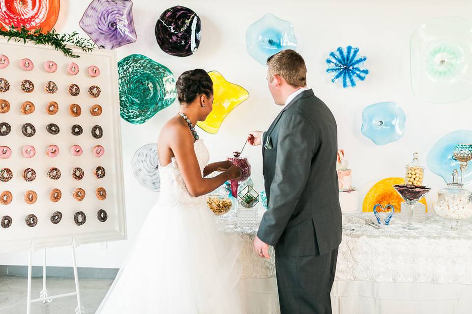 Our Donut Wall and Candy Buffet. Our Donut Wall is not made of pegboard and it the best out there! It can hold up to 80 Donuts, 80 Bagels or 120 Pretzels.