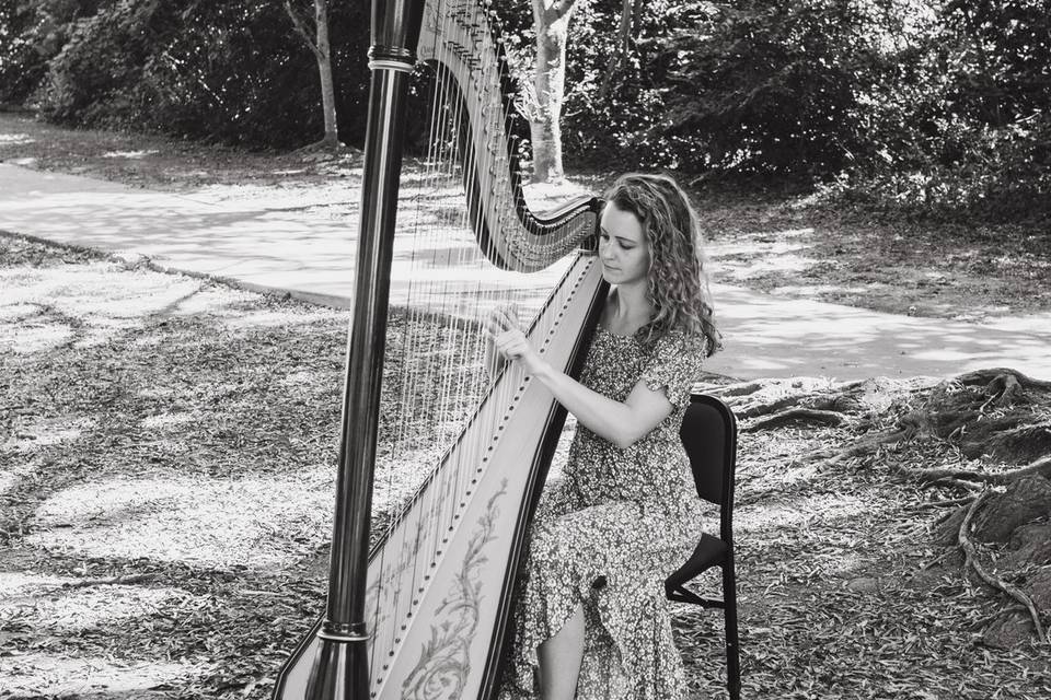 Hope playing harp