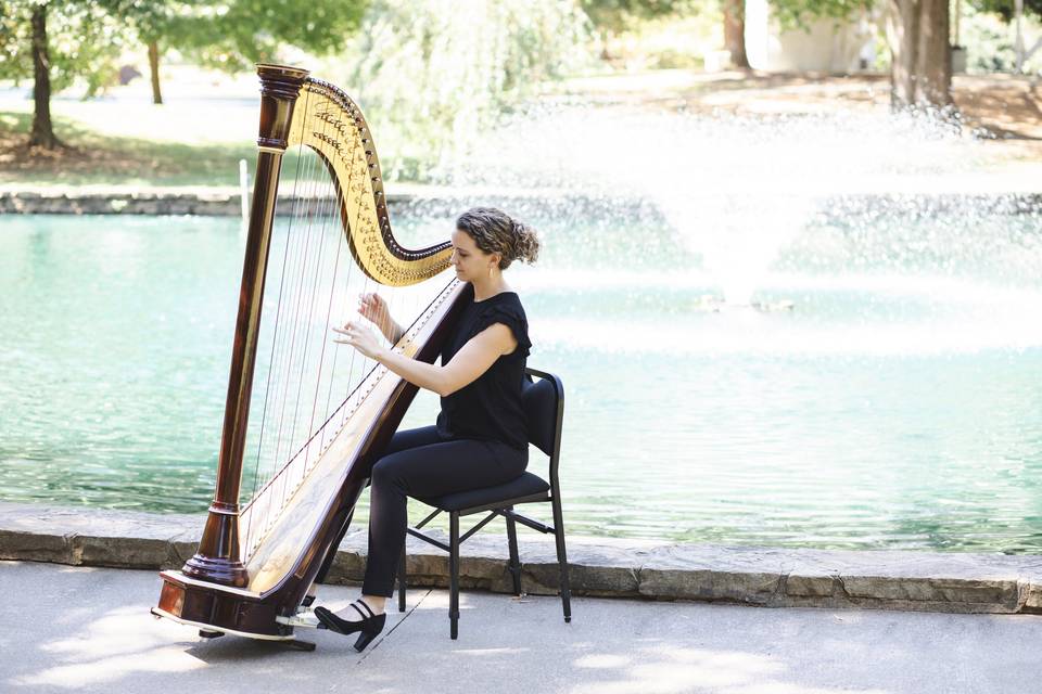 Hope playing harp