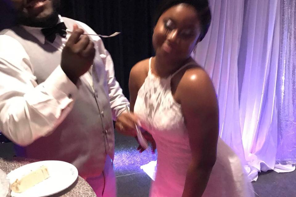 Bride and Groom enjoying cake