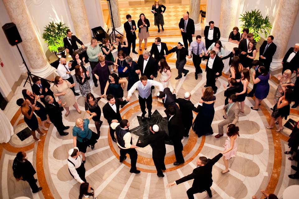 Couple and guests dancing