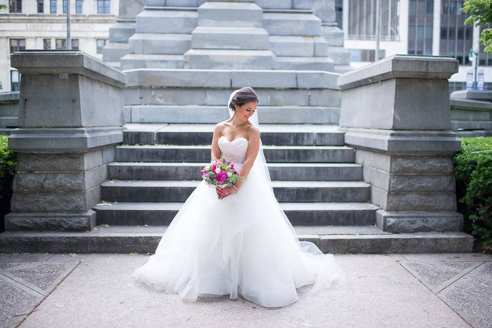 Bride by the stone stairs