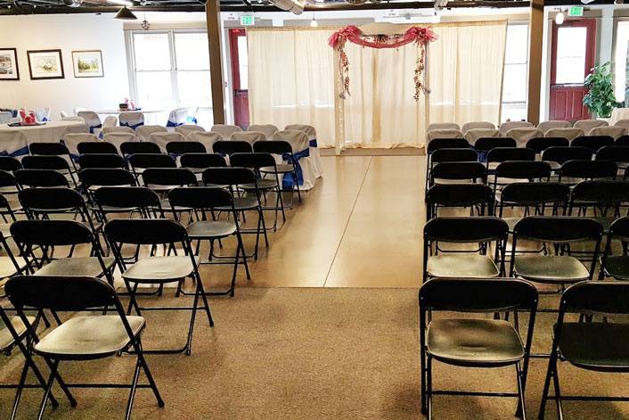 Indoor ceremony setup in event center