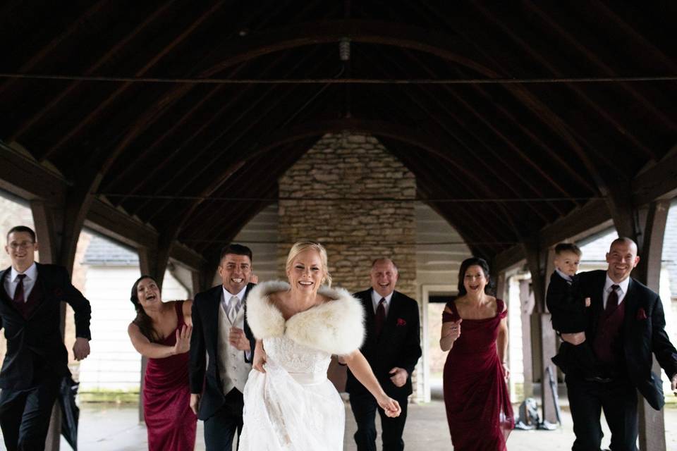 Bridal party running