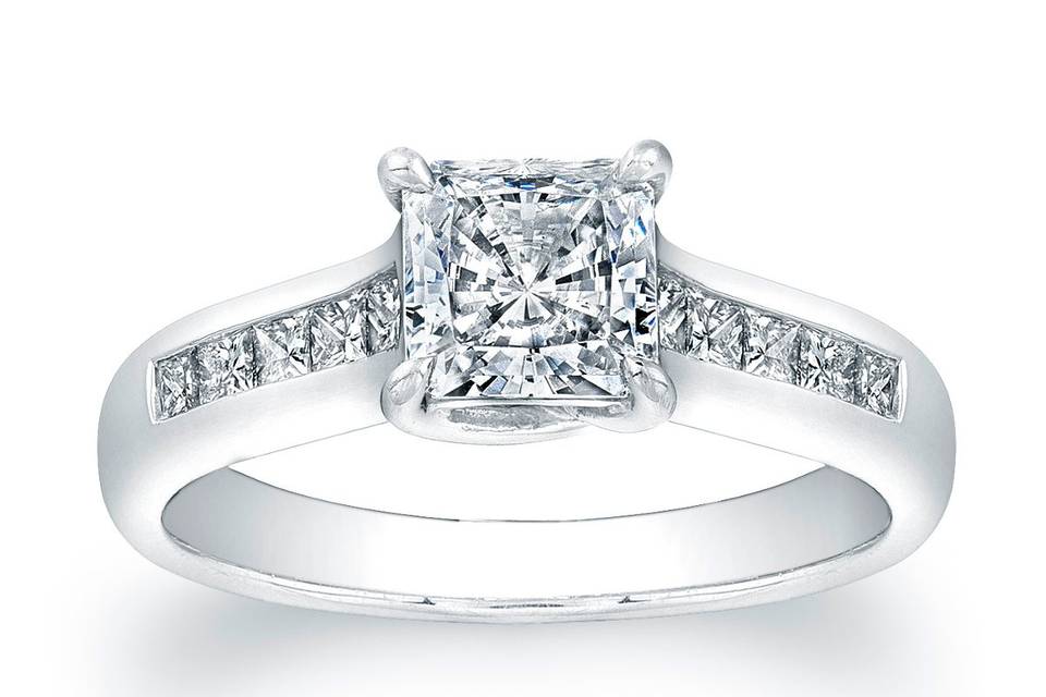 <b>Vatche Channel-Set Princess Cut X Prong Diamond Engagement Ring</b><br>This stylish engagement ring setting by Vatche features small princess cut diamonds that are channel-set and will perfectly compliment your choice of a center diamond.