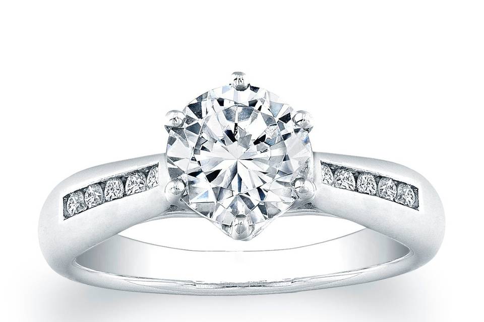 <b>Vatche Channel-set Royal Crown Engagement Ring .15ct tw</b><br>This sleek and stylish engagement ring setting by Vatche features 5 channel-set round brilliant diamonds on either side of your choice of a center diamond.