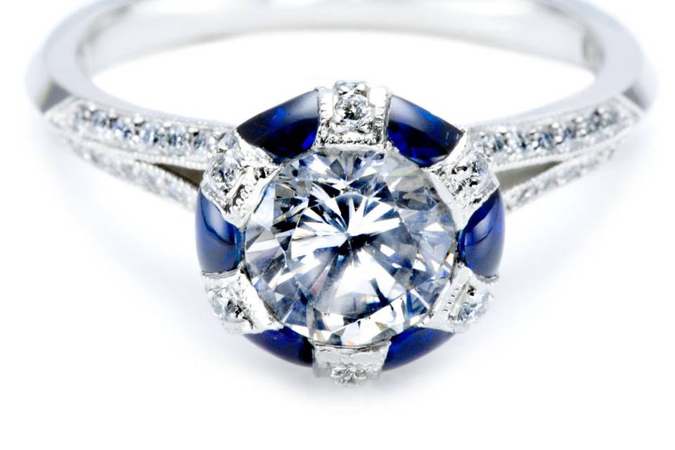 <b>Tacori Sapphire & Diamond Pave Engagement Ring</b><br>This Tacori engagement ring features half-moon sapphires and brilliant diamonds. Two rows of pave-set diamonds taper down each shoulder of the band. This ring comes in a larger setting for center diamonds over 1.10ct.