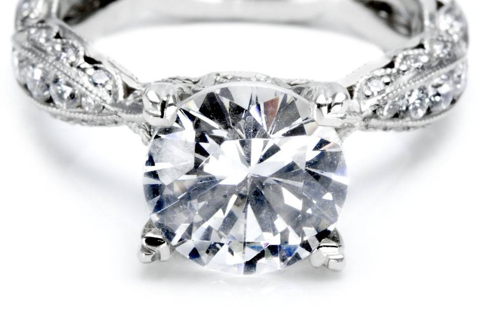 <b>Tacori Criss-Cross Channel-Set & Pave Diamond Engagement Ring</b><br>This diamond engagement ring has a criss-cross design with round channel-set diamonds, accented with round pave-set diamonds. This setting also comes in a larger size, for center diamonds greater than 1.20ct.