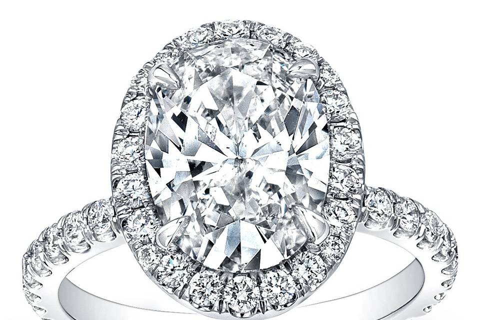 <b>Pave Diamond Halo Engagement Ring</b><br>This spectacular engagement ring is completely hand-made and features round brilliant pave-set diamonds surrounding your choice of a center stone.