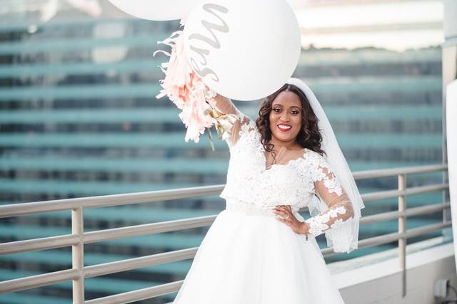 Bride poses by the rails