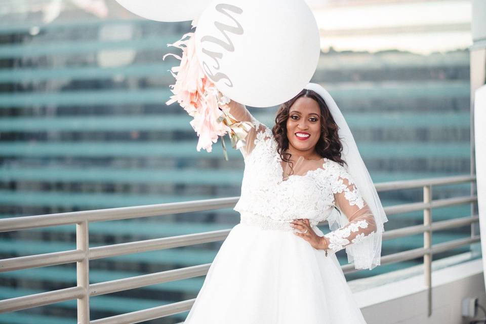 Bride poses by the rails
