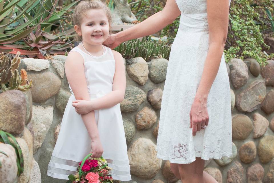 Blushing bride and her mini-me