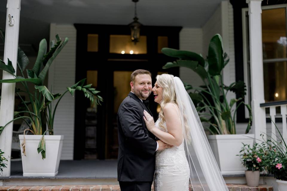 Bride and groom laugh