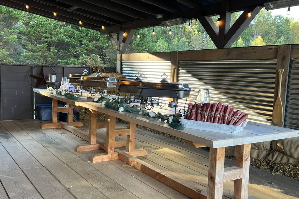 Barn table with catering.