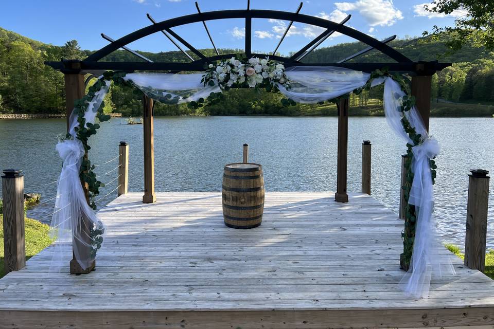 Pergola with wine barrel