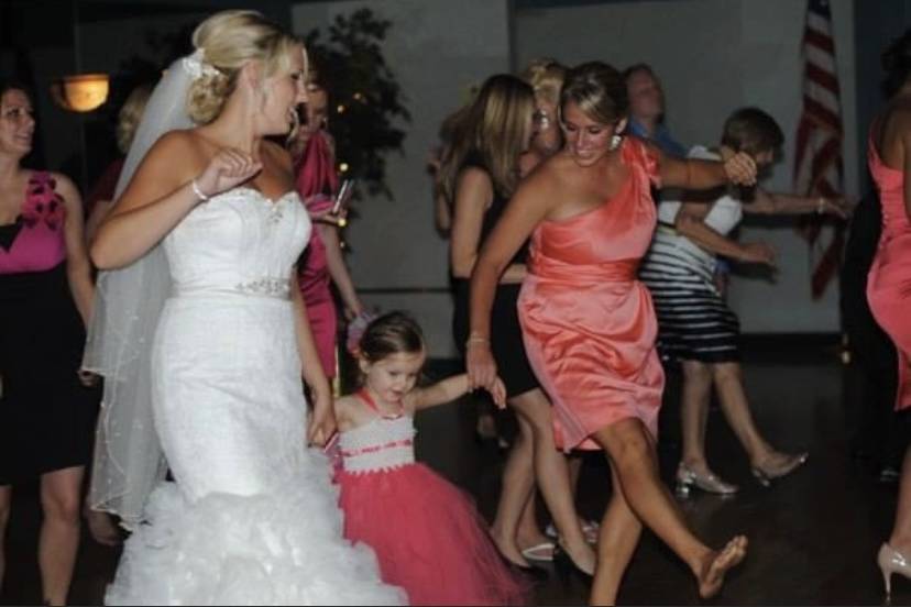 Bride maids daughter dancing