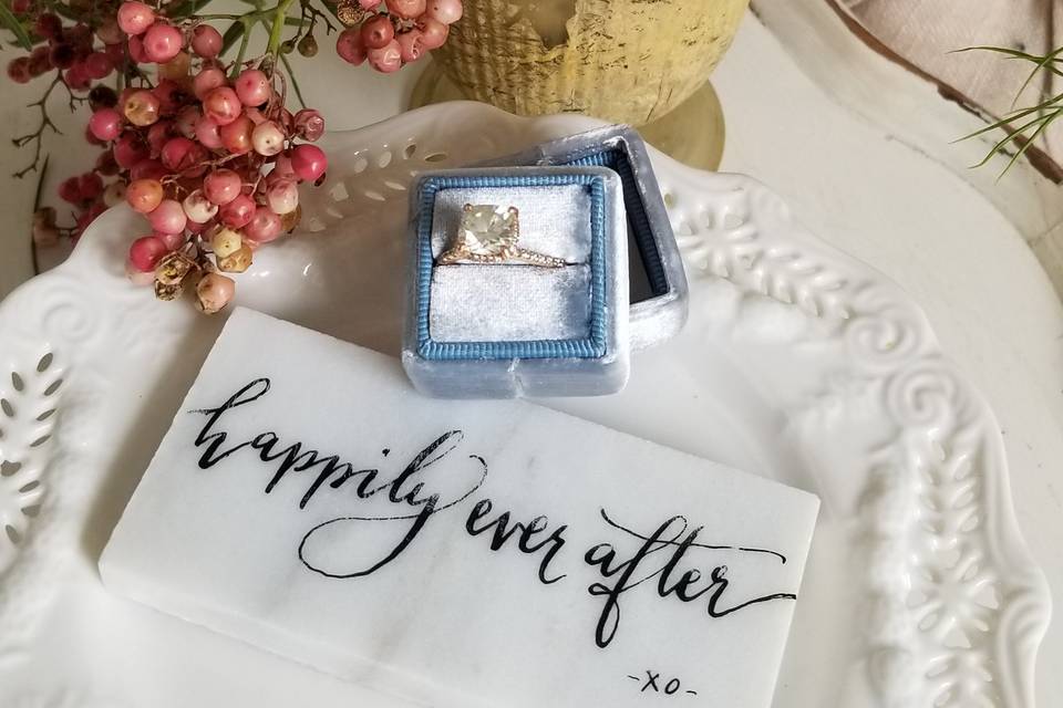 Place cards on marble tile