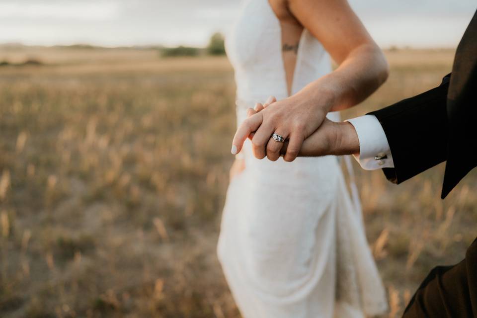 Couple holding hands details