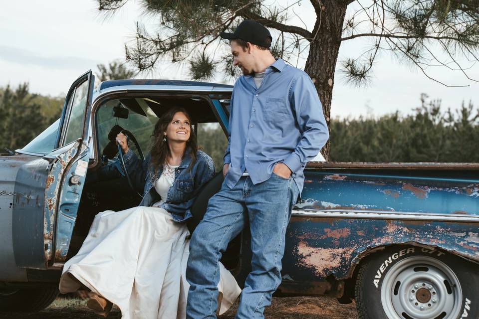 Wedding couple in a truck