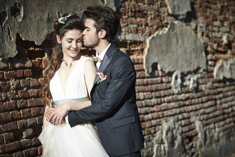 Bride and groom exposed brick