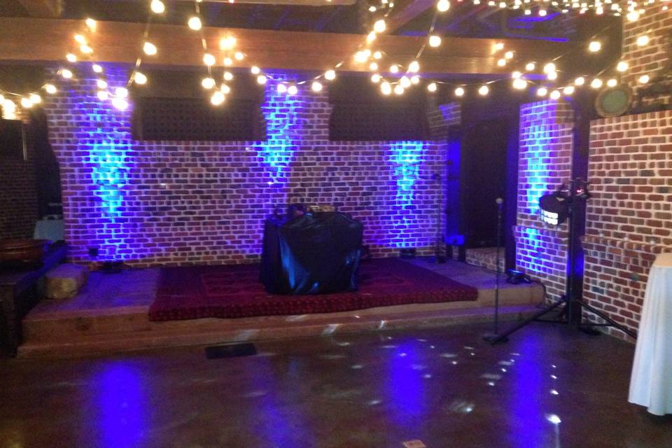 DJ set up with uplights. Wedding in Sausalito.