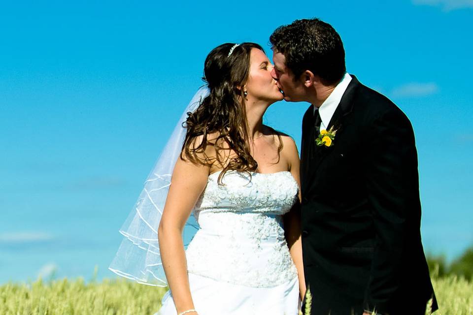 Newlyweds kissing