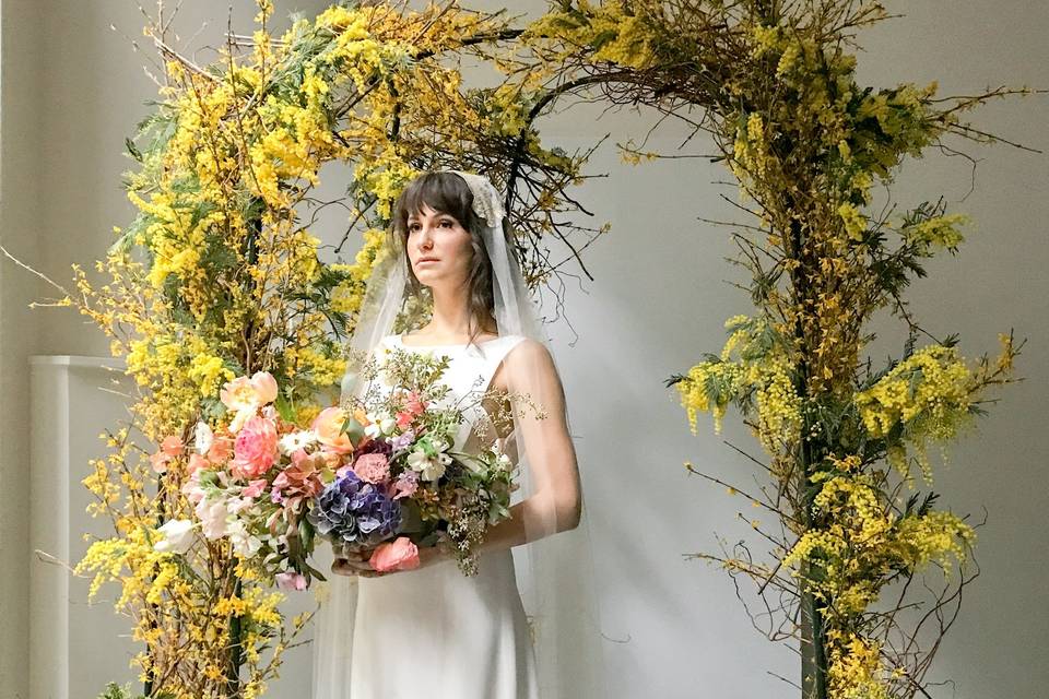 Flower arch & bride