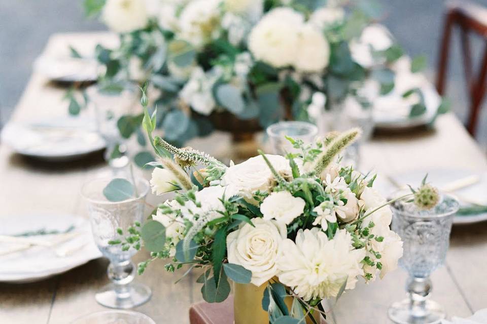 Table setting and floral centerpieces