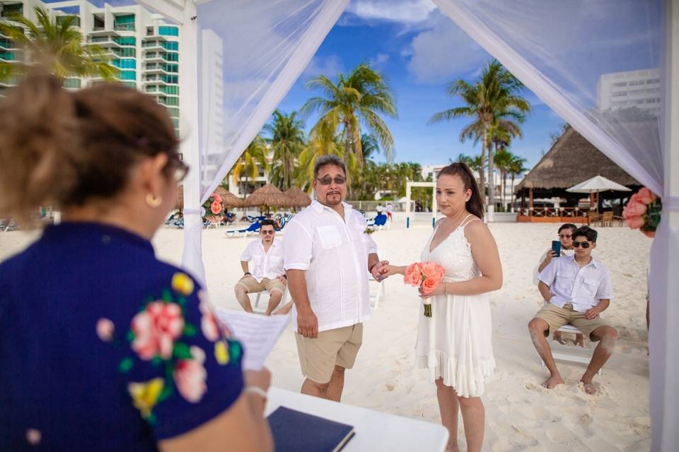 Vow renewal in beachscape Canc