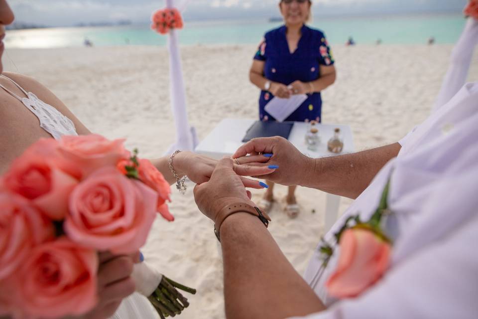 Vow renewal in beachscape Canc